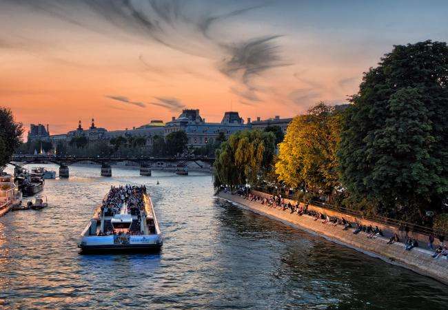 Discover Paris from the water aboard Bateaux Mouches or Riva boats